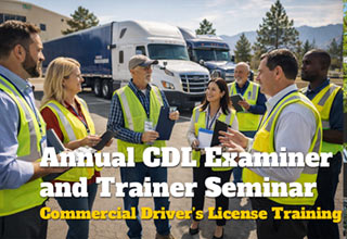 people standing in safety vests looking at semi tractor trailers.