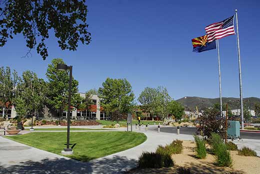 Outdoor campus view with flags